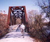 KATY Trail Bridge with cyclists - photo by KBH 3rd.