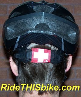 SafeTband mounted on bike helmet horizontal strap